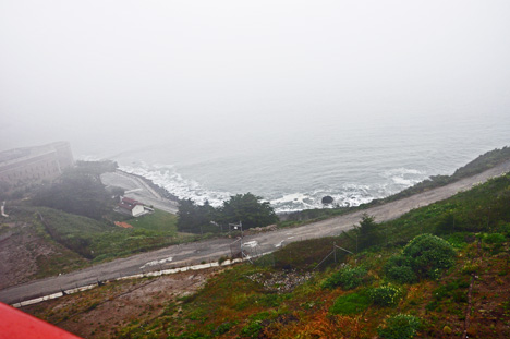 looking down from the side of the bridge